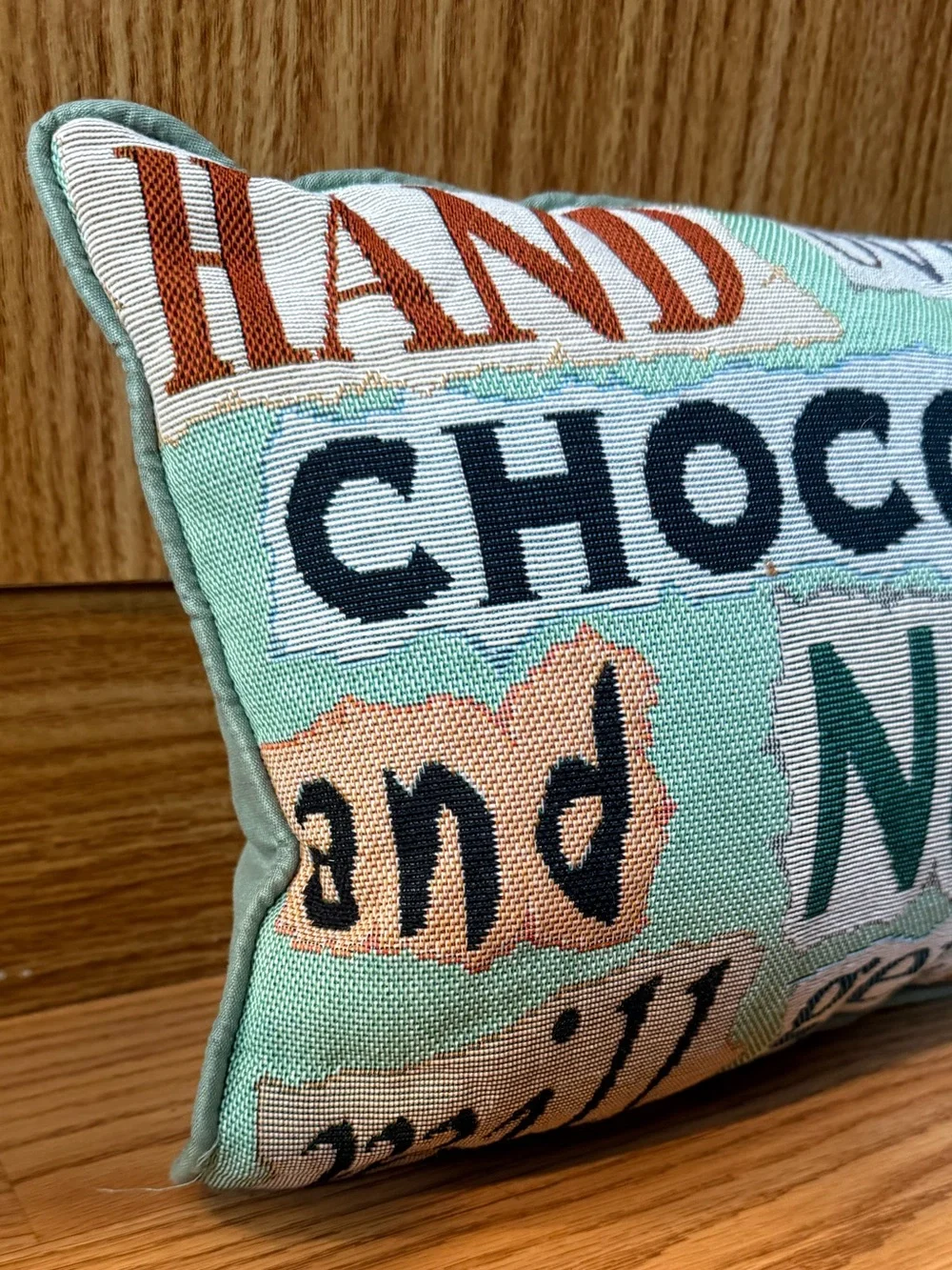Tapestry decor pillow with phrase: HAND over the CHOCOLATE and NO ONE gets hurt
